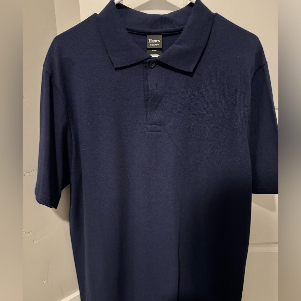 Hanes men’s polo… size large. Like new. Dark blue color